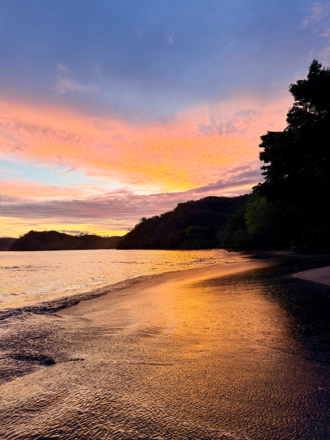 Sunset over a quiet Pacific-coast beach